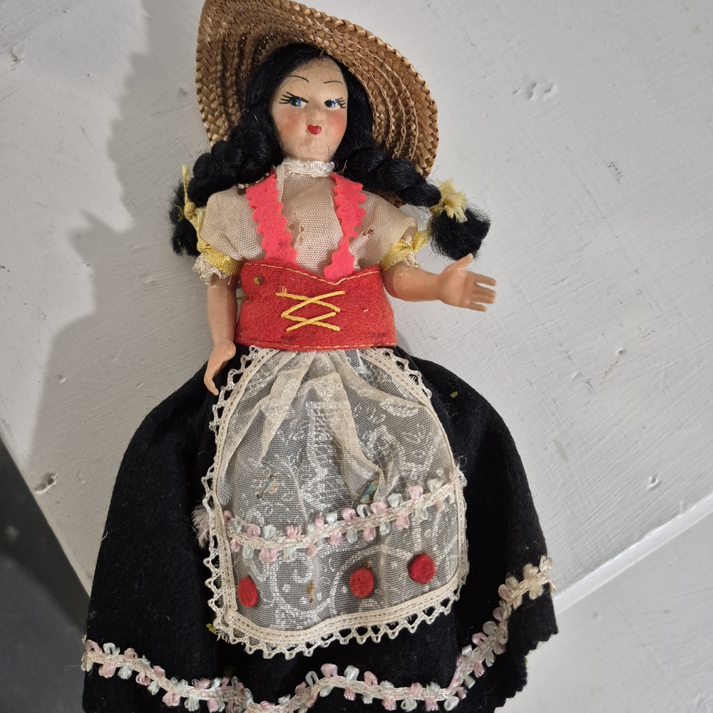 Traditional Doll with Black and Red Outfit